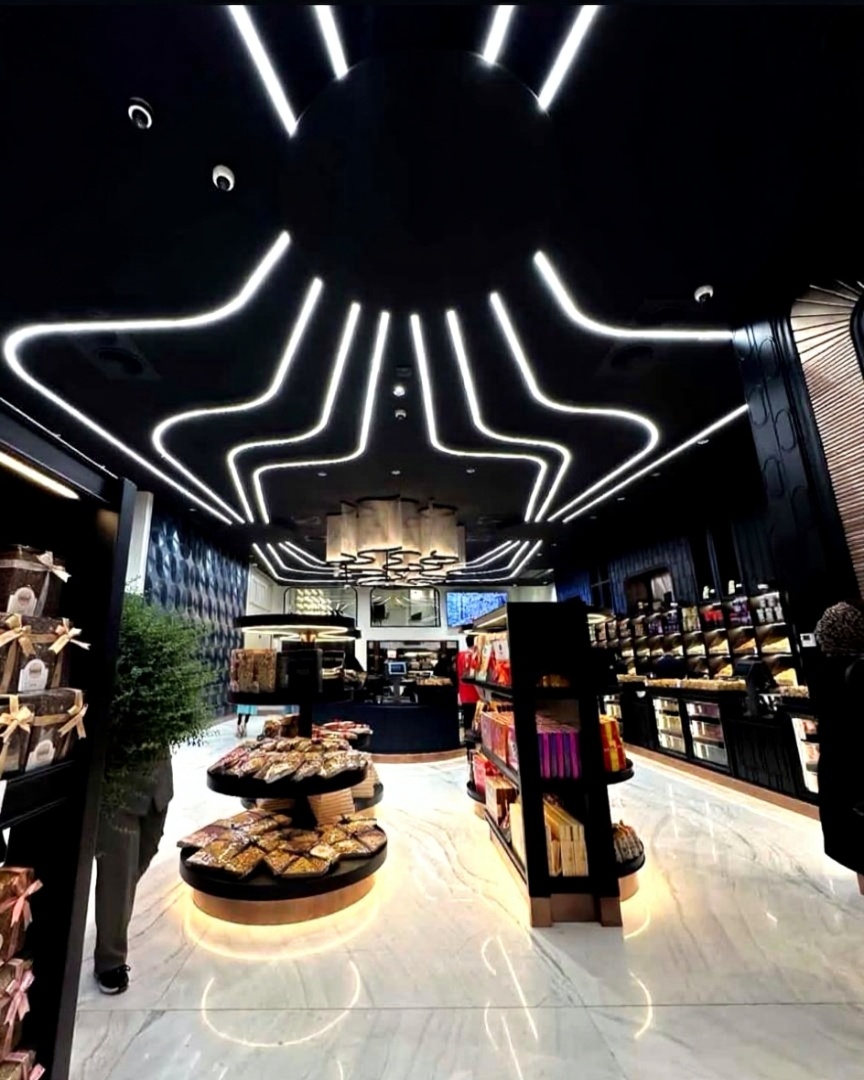 چراغ خطی منحنی توکار - پروژه فروشگاهی نورابین